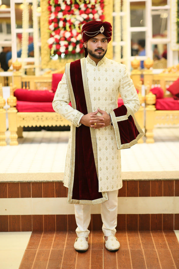 Ravishing Cream Traditional  Motifs Handwork and Embroidered Sherwani Set